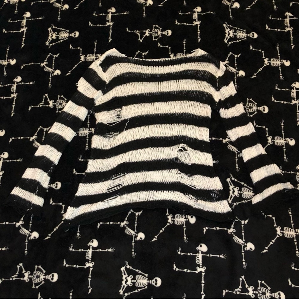 Black and white stripped ripped sweater